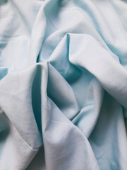 blue folded fabric