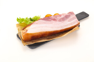 Smoked pork breast with salad leaves