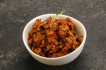 Canned anchovy in tomato sauce