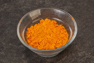 Tumeric powder in the bowl