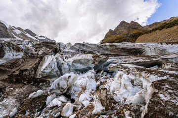 Alibek glacier. Autumn in Caucasus mountain. Eco tourism and hiking in mountain, travel destination.