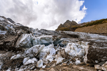 Alibek glacier. Autumn in Caucasus mountain. Eco tourism and hiking in mountain, travel destination.