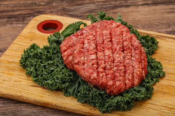 Raw beef burger cutlet for cooking