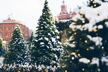 Christmas holidays, snowy winter landscape. Christmas fair on Festively decorated Red Square in...