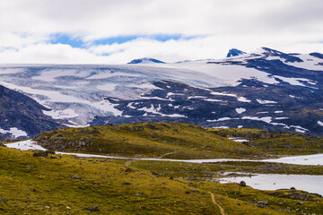 Mountains with ice glacier. Road Sognefjellet, Norway