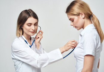 professional doctor with stethoscope heartbeat patient health work