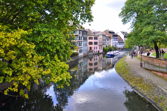 View of canal with reflections of the houses in Strasbourg, France.