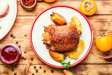 Meatloaf with persimmon on plate