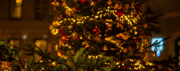 Christmas decorations on the street of the old town in Prague. Christmas illumination. Bokeh garlands in the background. Christmas, winter, new year concept.