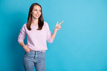 Photo of lovely pretty young girl toothy smiling direct finger interested look empty space hand...