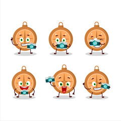 Photographer profession emoticon with compass cookies cartoon character