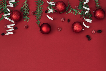 New Year's, festive decor on a red background. Copy space, flat lay, mock up, top view