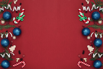 New Year's, festive decor on a red background. Copy space, flat lay, mock up, top view