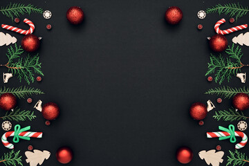 New Year's, festive decor on a black background. Copy space, flat lay, mock up, top view.