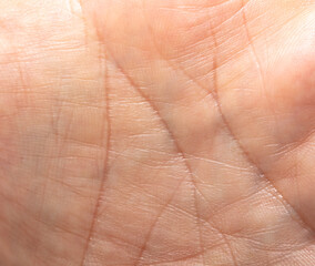 Close-up of lines on human skin as an abstract background.