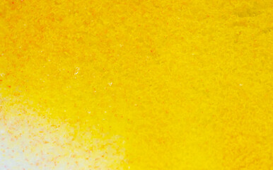 Fototapeta premium Yellow paint on the snow in winter.