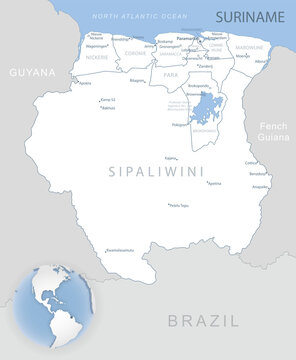 Blue-gray detailed map of Suriname administrative divisions and location on the globe.