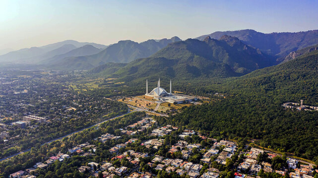 Aerial view of Shah Faisal mosque is the masjid in Islamabad, Pakistan. Located on the foothills of Margalla Hills. The largest mosque design of Islamic architecture
