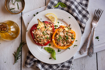 Halves of bell pepper stuffed with meat and vegetables