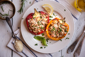 Halves of bell pepper stuffed with meat and vegetables