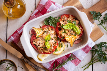 Halves of bell pepper stuffed with meat and vegetables