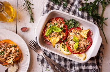 Halves of bell pepper stuffed with meat and vegetables