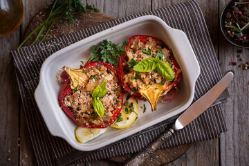 Halves of bell pepper stuffed with meat and vegetables