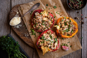Halves of bell pepper stuffed with meat and vegetables