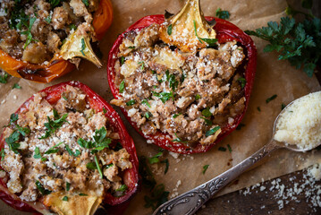 Halves of bell pepper stuffed with meat and vegetables