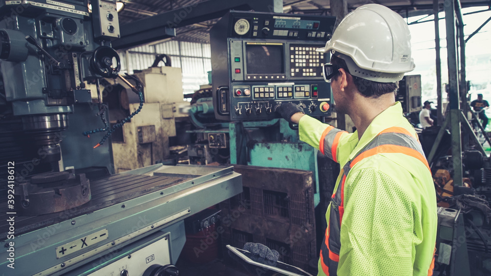 Poster smart factory worker using machine in factory workshop . industry and engineering concept.