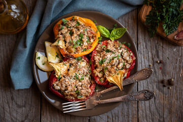 Halves of bell pepper stuffed with meat and vegetables