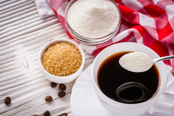 cup of fragrant fresh coffee on a white wooden rustic background