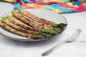 Seasonal fresh asparagus fried with bacon	