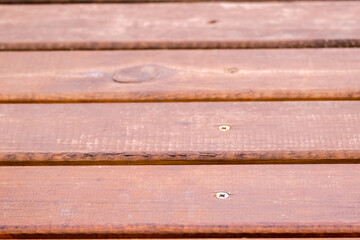 Texture of old wooden brown painted bridge floor abstract background.