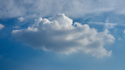 Cumulonimbus cloud on blue sky background on Lecco city 