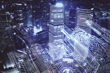 Double exposure of buildings hologram over cityscape background. Concept of smart city.