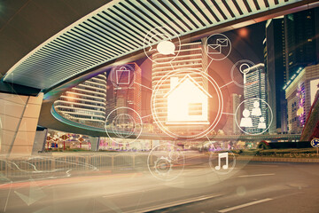 Double exposure of buildings hologram over cityscape background. Concept of smart city.