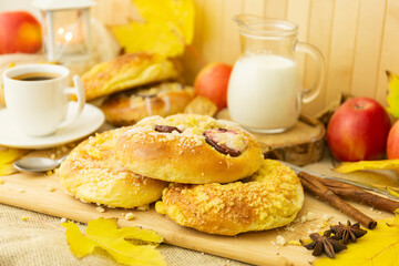 Coffee and milk, cookies, pie, autumn wooden background