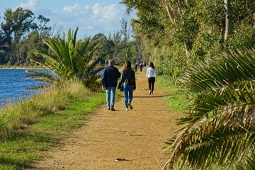 Fototapeta na wymiar Walking path by Lake Fogliano, Circeo National Park, Italy