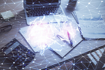 Double exposure of desktop computer and human brain drawing hologram. Ai concept.