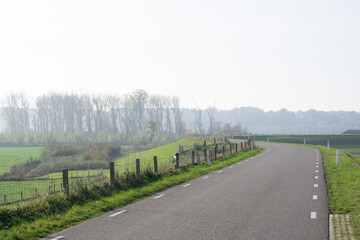 Misty Dutch polder landscape in Holland