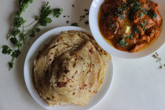 Homemade Malabar parotta with butter chicken