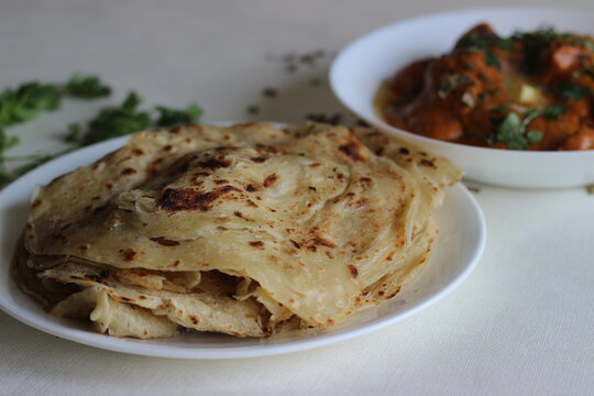 Homemade Malabar parotta with butter chicken