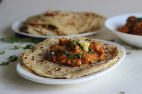 Homemade Malabar parotta with butter chicken