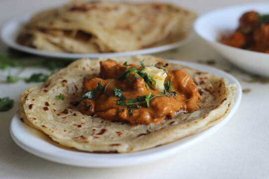 Homemade Malabar parotta with butter chicken