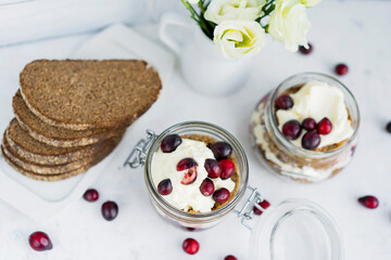 Latvian, scandinavian traditional rye whole grain bread layered dessert with whipped cream and...
