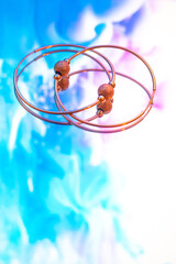 earrings on bright background