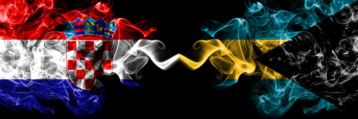 Croatia, Croatian vs Bahamas, Bahamian smoky mystic flags placed side by side. Thick colored silky abstract smoke flags.