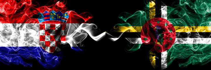 Croatia, Croatian vs Dominica, Dominican smoky mystic flags placed side by side. Thick colored silky abstract smoke flags.