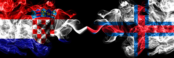 Croatia, Croatian vs Faroe Islands, Faroese smoky mystic flags placed side by side. Thick colored silky abstract smoke flags.